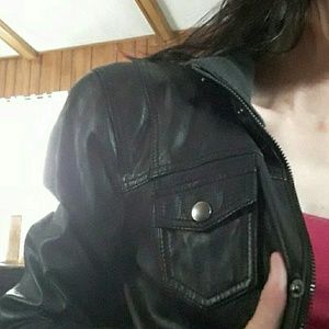 Womens black leather jacket.